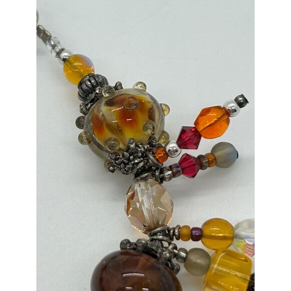 Artisan Lampwork Glass Bracelet With Amber Gold Swirl and Faceted Beads - Picture 9 of 16